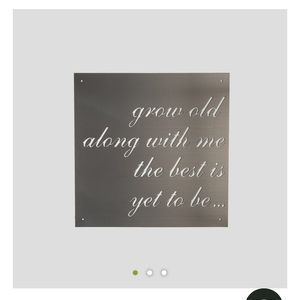 Magnolia metal cutout sign.